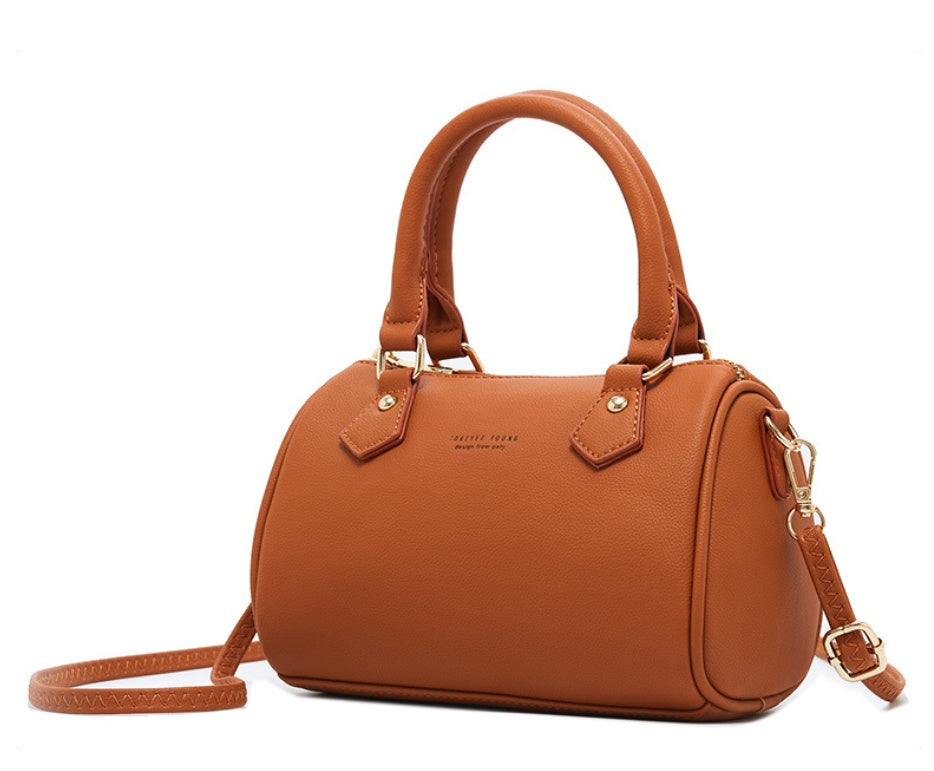 Elegant Tan Ladies Pillow Bag - Chic Diagonal Handbag for Everyday Style.